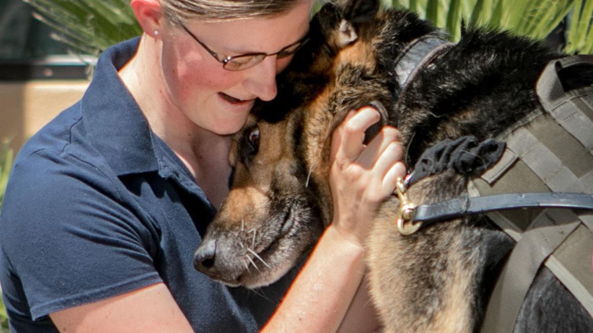 Davis-Monthan staff sergeant reunited with retiring canine partner